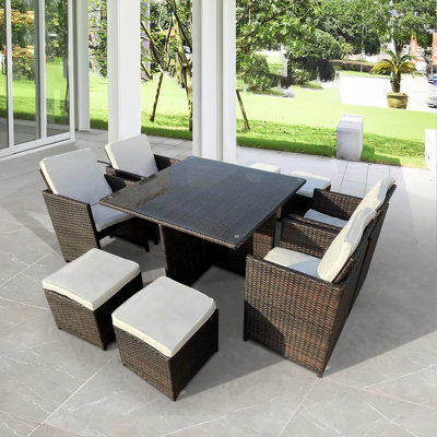 Cateisha 8 - Person Wicker Patio Dining Set with Square Table , Cushions Included