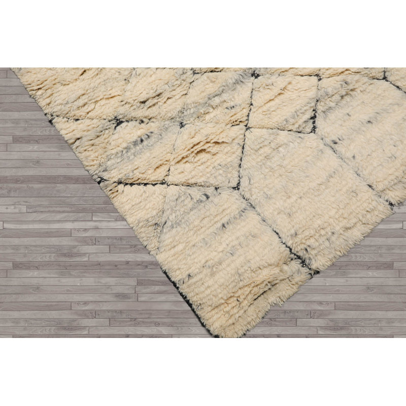 Tapis intérieur / extérieur ivoire en laine noué à la main Kolsuma