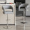 Ensemble de 2 tabourets de bar réglables George avec accoudoirs à dossier George, tabourets de comptoir pivotants en cuir de polyuréthane moderne avec repose-pieds, chaises d'îlot de cuisine pour la salle à manger, bar maison, café, gris