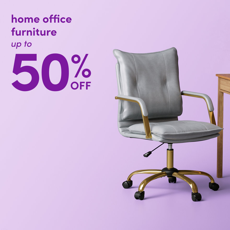 Home office furniture up to 50% off, featuring a grey upholstered desk chair with gold accents on a light purple background.