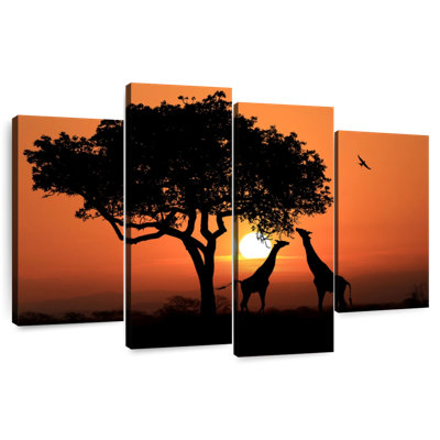Couple de girafes au coucher du soleil
