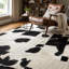 Tapis en cuir de vache noir et blanc fabriqué à la main, tapis en cuir géométrique-725716321