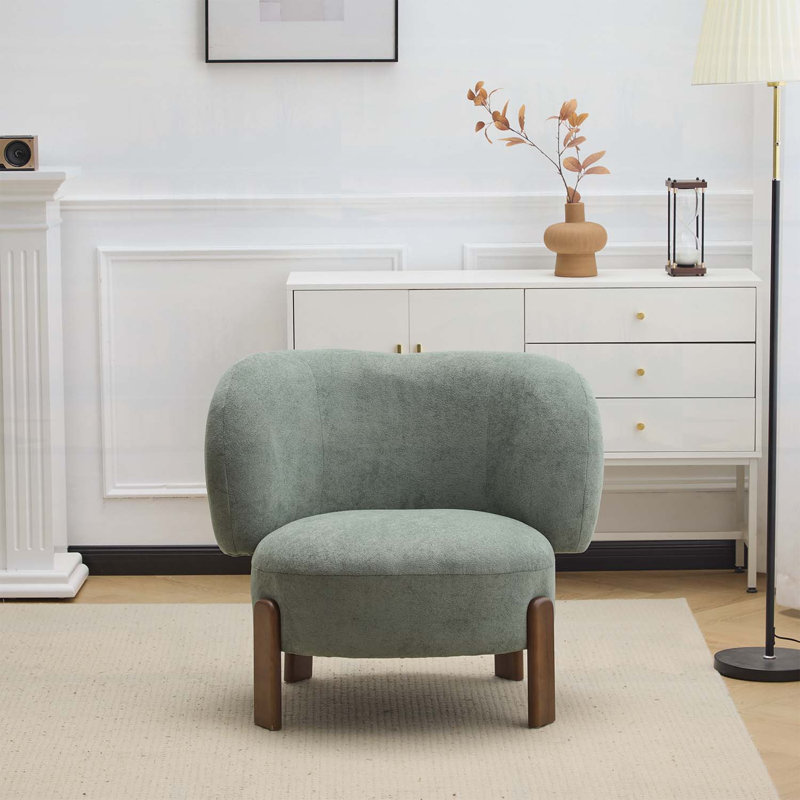 Élégant fauteuil à oreilles avec pieds en bois pour un confort ultime, Vert