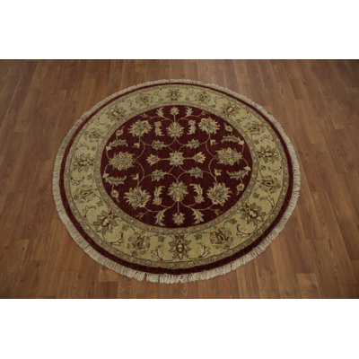 Tapis rond élégant avec motif floral complexe inspiré de la nature