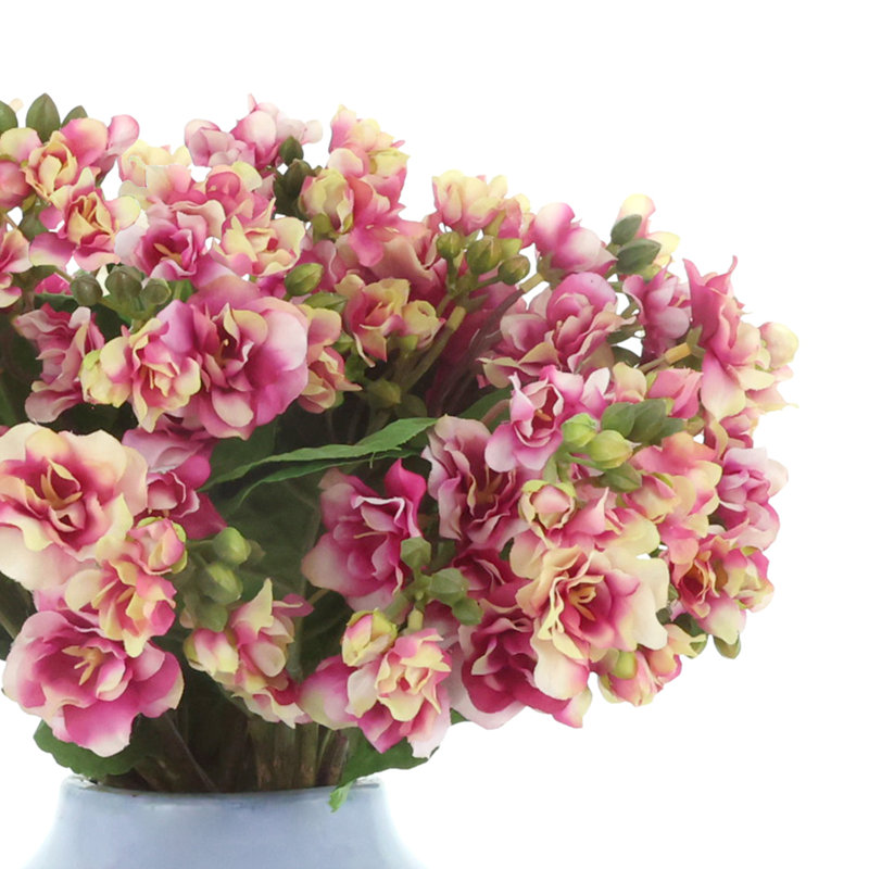 Violets Arranged in Ceramic Vase