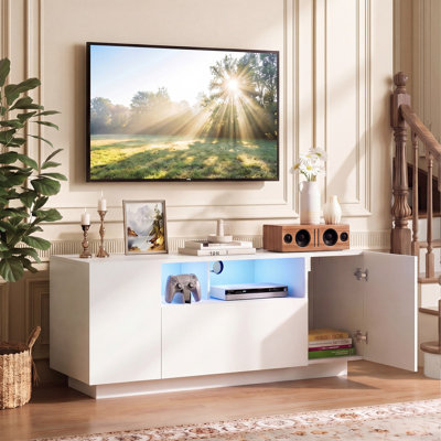 Meuble télé Manjesh pour téléviseurs DEL de 55 pouces avec grands placards de rangement, centre multimédia moderne avec étagères ouvertes et éclairage DEL personnalisable, console multimédia idéale pour le salon, la chambre ou une salle de jeux.