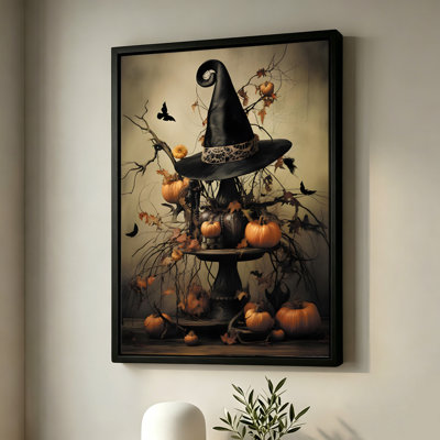 Chapeau de sorcière d'Halloween sur un présentoir à étages avec citrouilles, tableau sur toile encadré, cadre beige, 50 x 75 cm