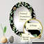 Feuilles vertes tropicales sur fond noir - miroir mural tropical ovale-1990870224