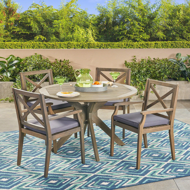 Obrien 4 - Person Acacia Wood Patio Dining Set with Round Table