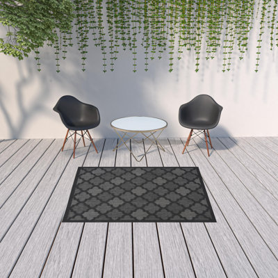 Adianey Red Barrel Studio Easy Care Trellis Charcoal/Black Indoor/Outdoor Area Rug