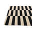 Tapis noir et blanc Newsom