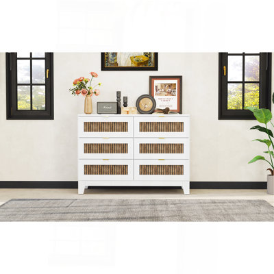 Charming Wooden Dresser With Six Drawers And Metal Handles, A Stylish And Practical Bedroom Storage Solution.