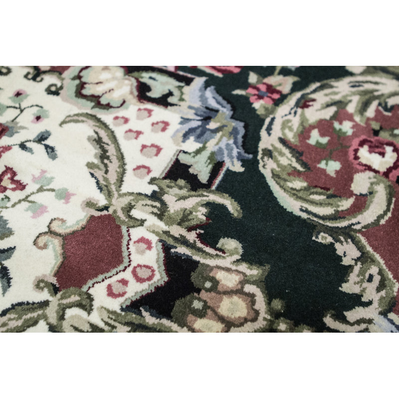 Tapis vert noué à la main de haute qualité