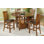 Schueller 60 " Extendable Round with Solid Wood Base Dining Table
