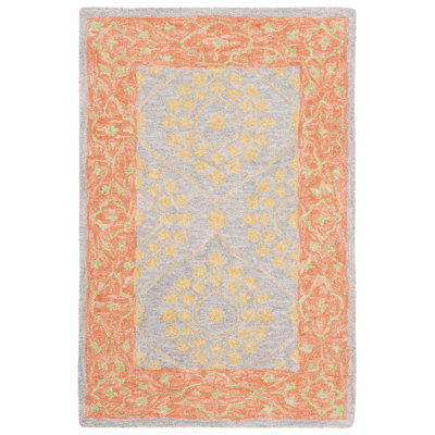 Guzi Hand Hooked Wool/Cotton Floral Rug in Orange/Silver