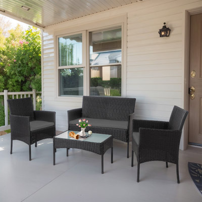 Shena 4 Person Patio Outdoor Seating Group with Cushions