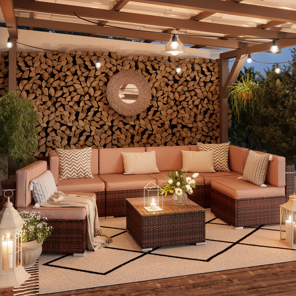 Leisure 7 Piece Rattan Sectional Seating Group with Cushions