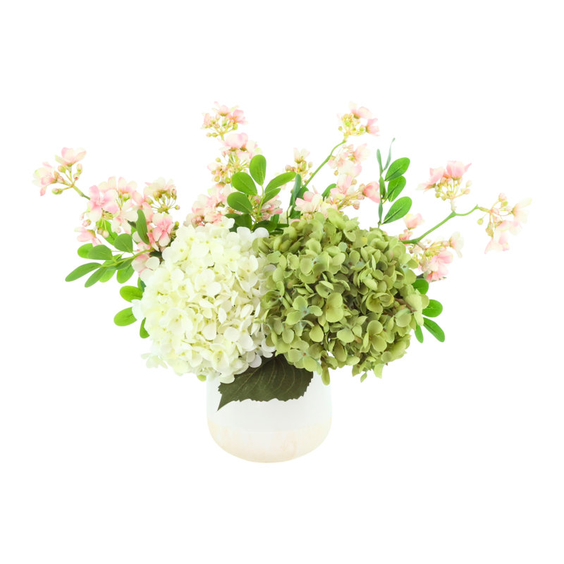 Arrangement assorti d'hortensias et de Stephanotis