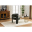 Fauteuil d'appoint confortable, recouvert d'un tissu bouclé contemporain, aux lignes cylindriques harmonieuses et offert en plusieurs coloris. Revêtement en tissu pour fauteuil - Design et confort d'assise.