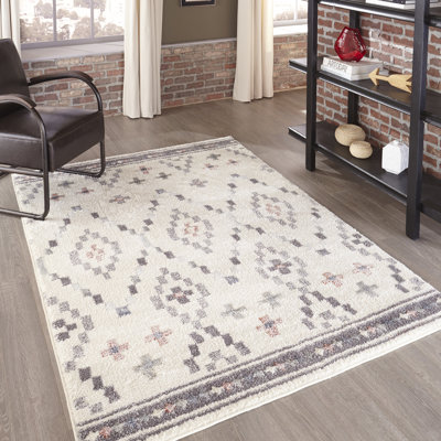 Tapis à motif géométrique ivoire Begley