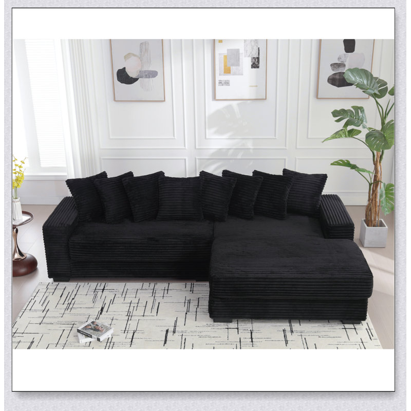 Canapé confortable surdimensionné en velours côtelé avec plusieurs coussins pour une détente ultime et un style moderne