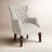Fauteuil d'appoint à oreilles capitonné Hannah-530619750