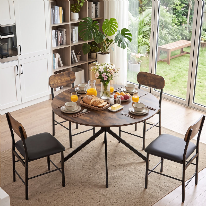 Ensemble de table et de chaises rondes de 5 pièces pour 4 personnes, de style moderne du milieu du siècle, avec des sièges en similicuir, idéal pour les petits espaces.