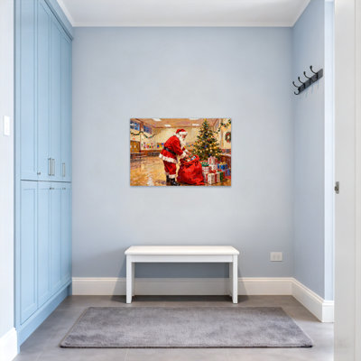 Christmas Santa Claus Packing Gifts Near Tree