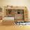 Lit mezzanine simple au-dessus de simple avec bureau intégré et escalier, avec compartiments de rangement et tablettes
