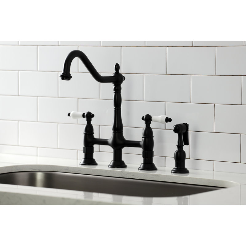 Kingston Brass Heritage Two-Handle 4-Hole Deck Mount Bridge Kitchen Faucet with Brass Side Sprayer, Matte Black