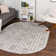 Tapis gris argenté à motif géométrique glam