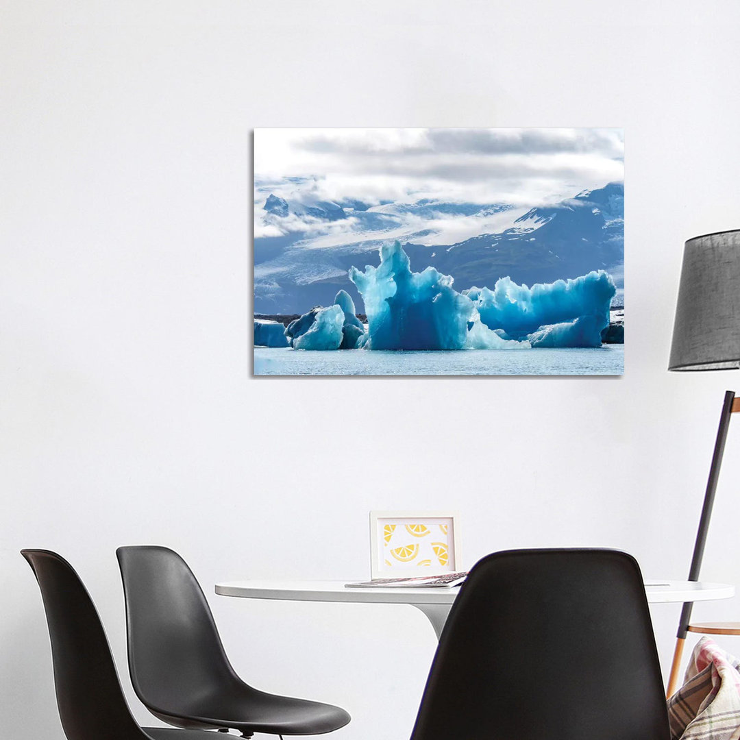Iceland, Floating Glaciers Form Blue Ice Sculptures In Jokulsarlon, Glacier Lagoon. by Mark Williford - Wrapped Canvas Print
