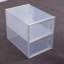 Boîte de rangement pliable pour chaussures dans la maison