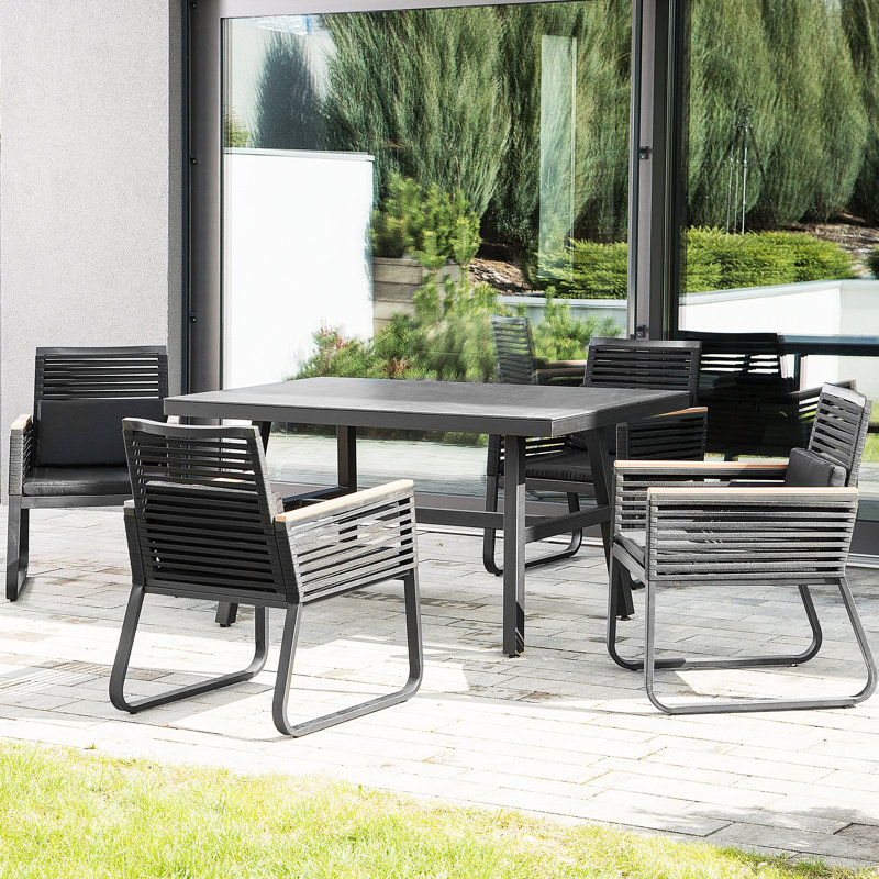 Herd 4 - Person Patio Dining Set with Rectangular Table , Cushions Included