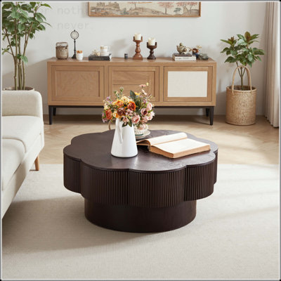 Table basse en forme de fleur avec rangement caché