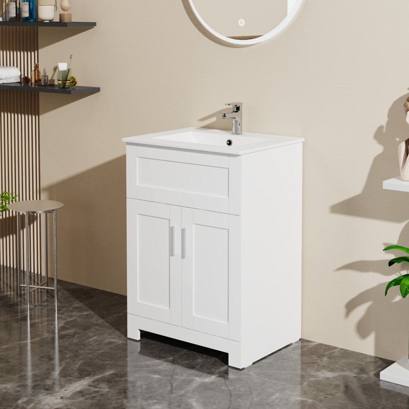 Meuble-lavabo blanc 24 po avec armoire à lessive. Matériau, lavabo en céramique. Rangement pratique et élégant. Unité de manuel d'assemblage. Fabriqué, lavabo. Espace de rangement élégant de style suffisant. Inclus