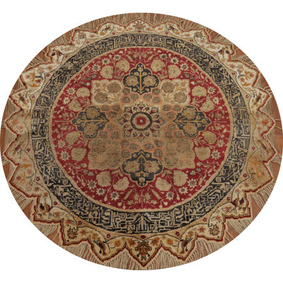 Tapis rond teint en soie antique