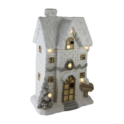 22.5" LED Lighted Musical Snowy Brick House Christmas Decor