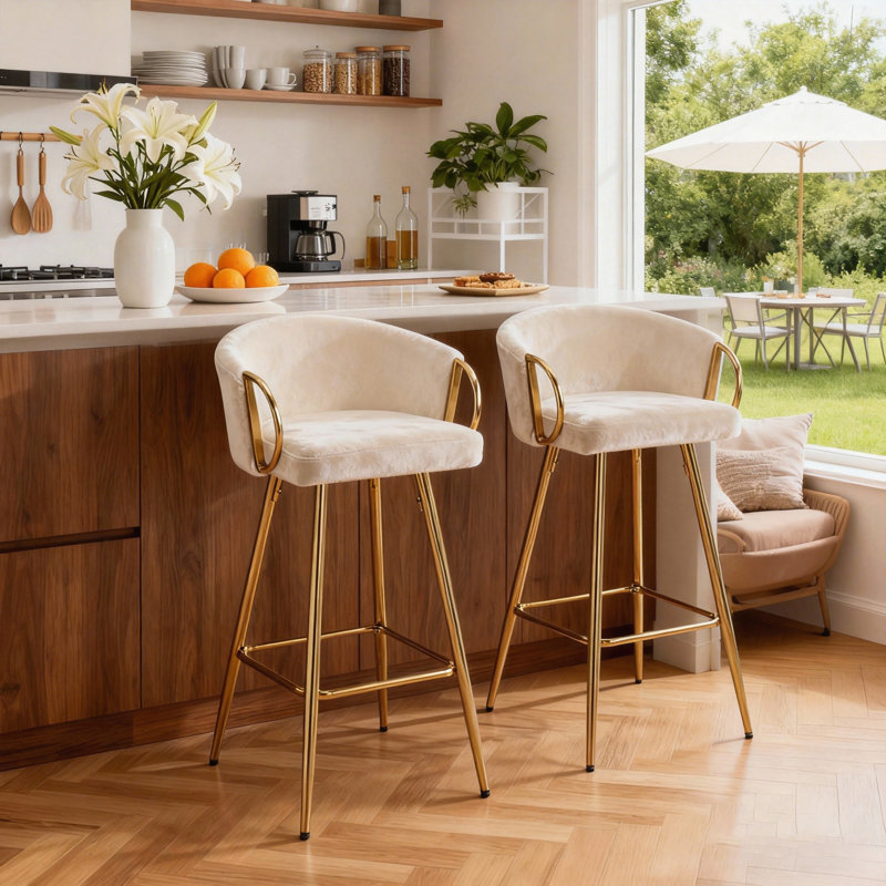 Ensemble de 2 tabourets de bar avec repose-pieds chromé et pieds dorés