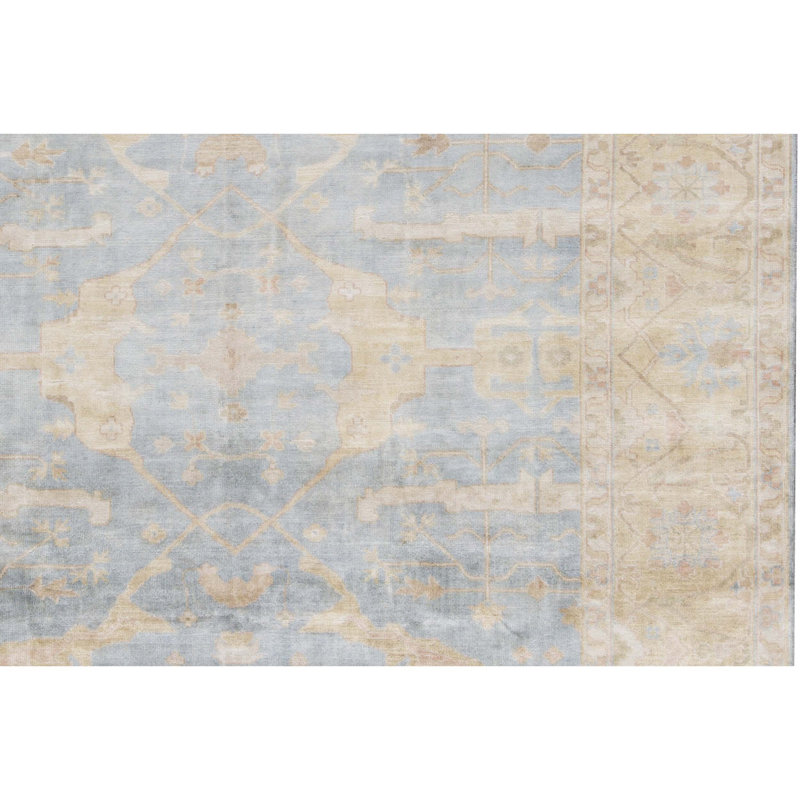 Tapis bleu clair et doré de haute qualité noué à la main