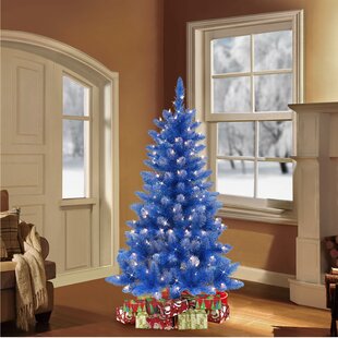 white pencil tree with blue lights