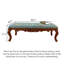 Banc rembourré vintage en tissu floral avec pieds en bois ornés