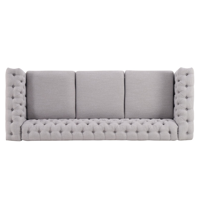 Sione 83" Upholstered Chesterfield Sofa Bring home a timeless addition to your living room with our lasting Chesterfield-style sofa