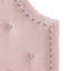 Tête de lit simple en tissu rosé avec coutures captivantes et garniture cloutée élégante aux accents contemporains