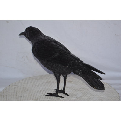 Hutzler Raven with his head up Bronze Statue - Size: 23"L x 6"W x 13"H.