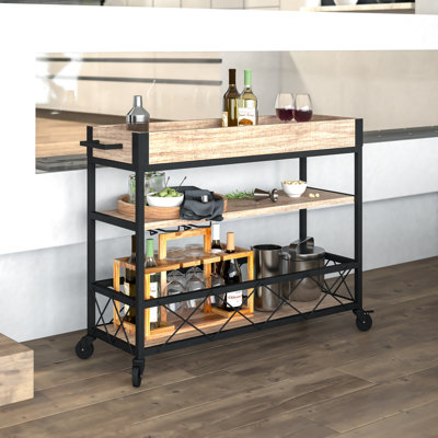 Chariot-bar en bois de chêne clair Netto avec support à verres à pied et tablette inférieure