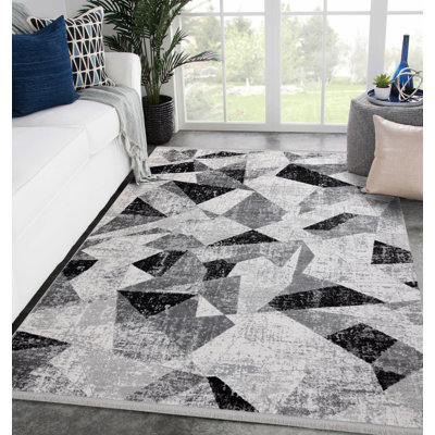 Ralfs Geometric Area Rug