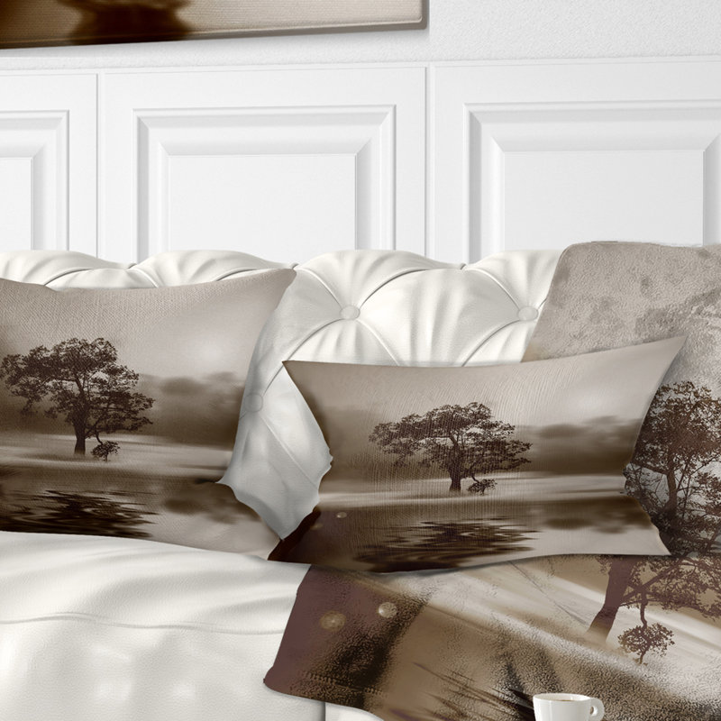 Coussin lombaire paysage seul sur une île en sépia