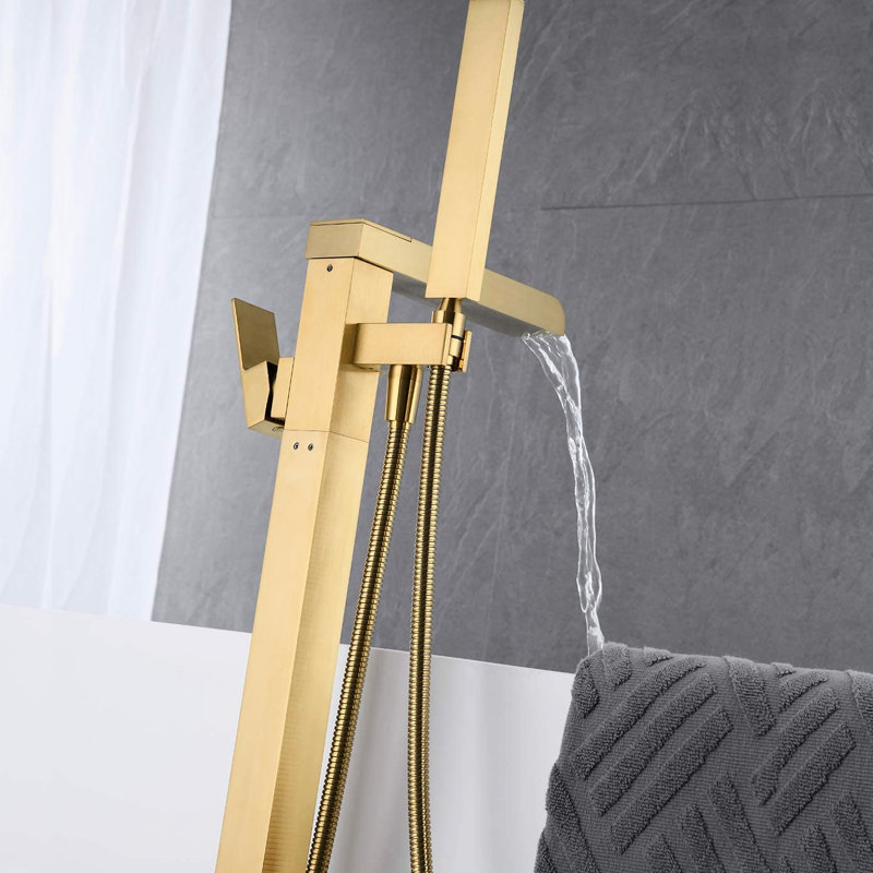 Robinet de salle de bain élégant à poser sur pied - Robinet de baignoire cascade en or brossé avec douchette et fonctionnement fluide. Bec fixe et douchette fiable pour une utilisation quotidienne.