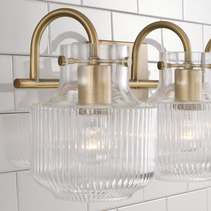 Aged Brass 3-Light Vanity with Clear Fluted Glass Shades